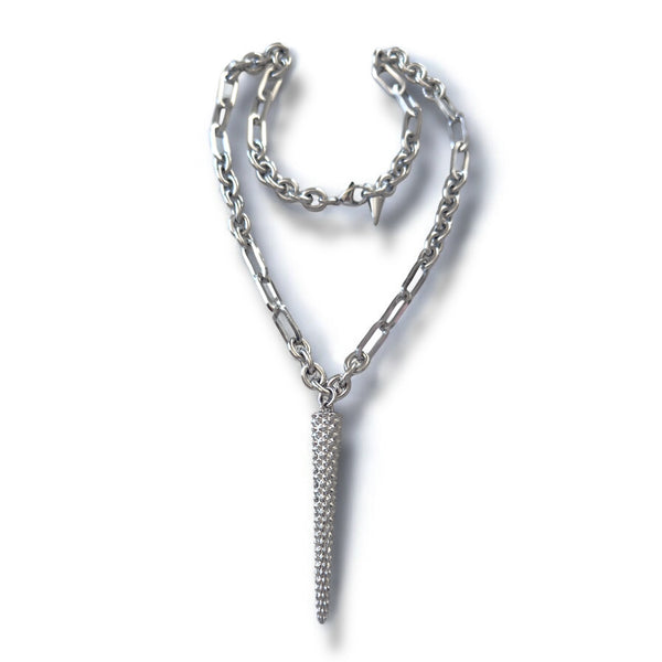 Silver chain necklace with a textured pendant on a white background