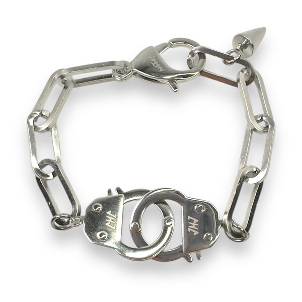 A gold-plated stainless steel chain bracelet with two handcuff-shaped clasps and dual lobster claws, designed to be adjustable.