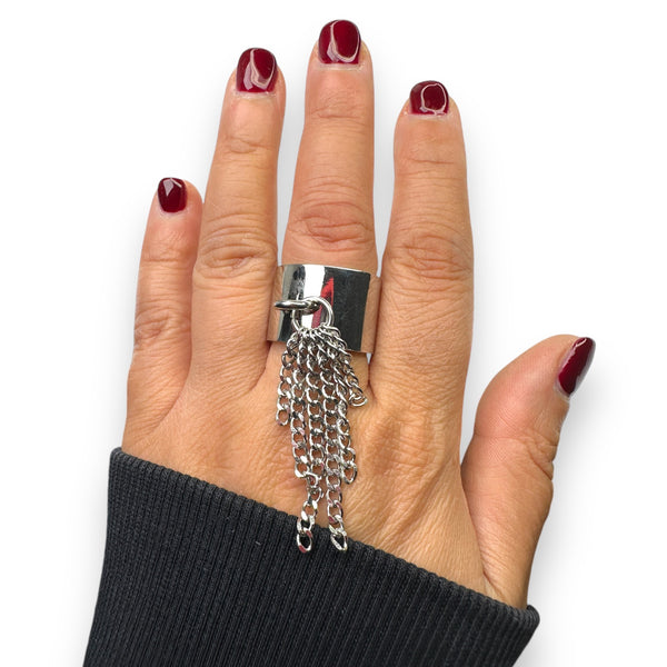 model with painted nails in malaga wine nail polish color tassel ring in white gold jagged halo jewelry