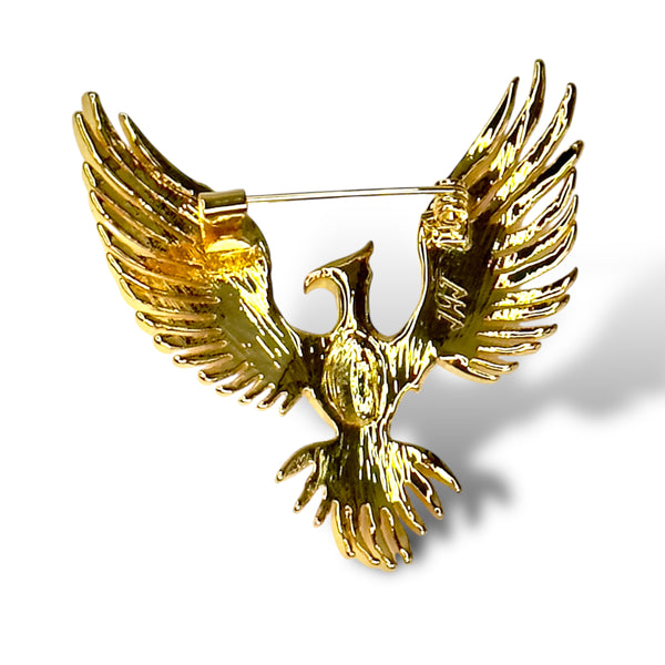 Phoenix Brooch showing pin back agains white background