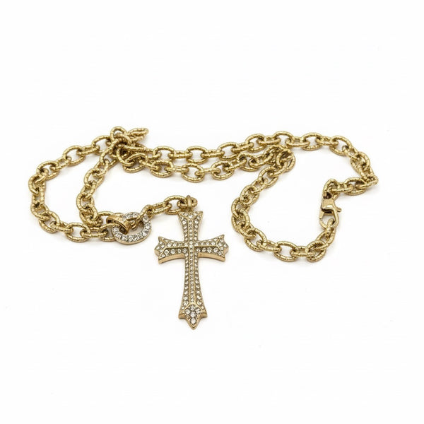 Gold chain Necklace with a cross pendant on a white background saints necklace by jagged halo jewelry