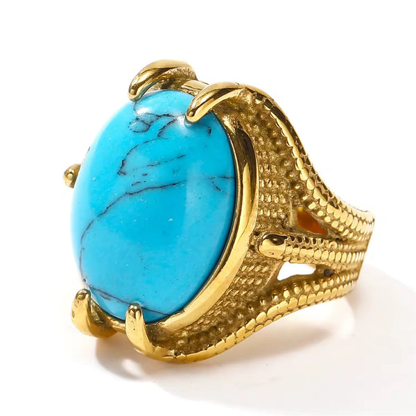 Gold dragon claw ring with turquoise stone