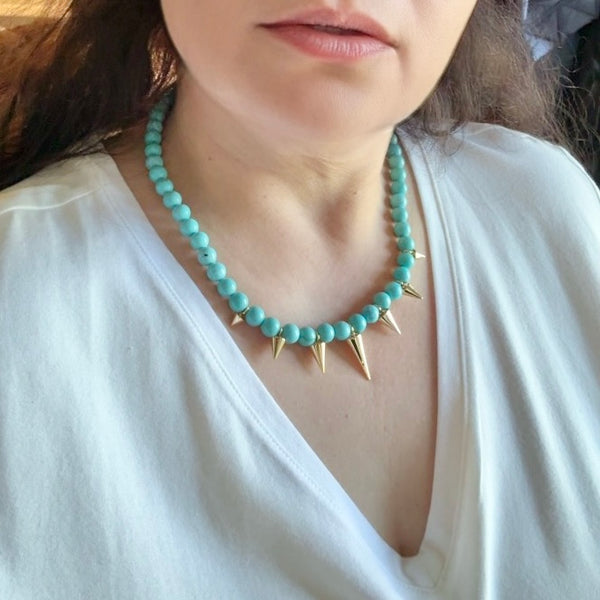 white v neck t-shirt turquoise bead necklace with gold spikes