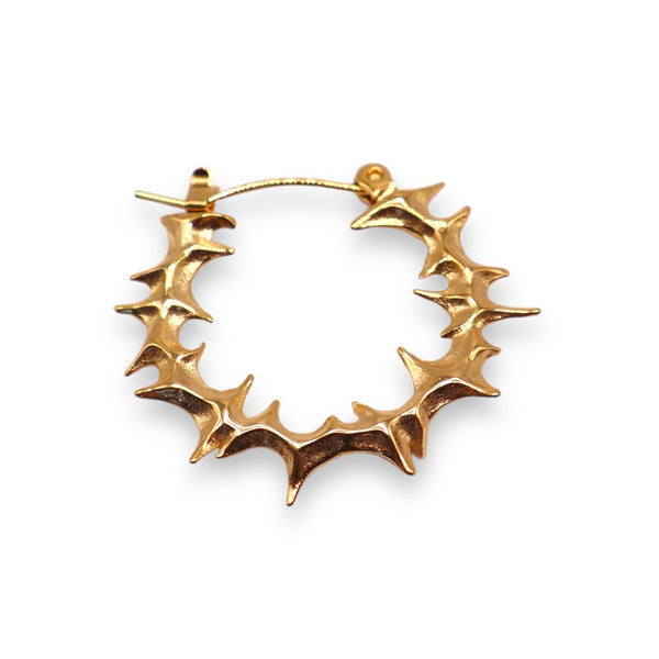 A pair of gold-colored Yennefer spike hoop earrings with an organic edgy spiked outer layer on a white background.