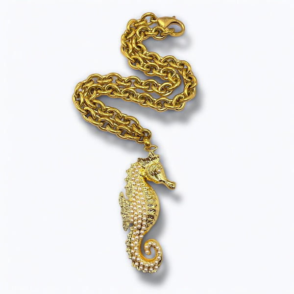 chunky stainless steel chain seahorse pendant in yellow gold by jagged halo jewelry