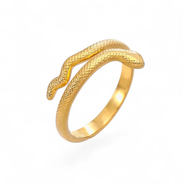 Gold snake-shaped ring on a white background