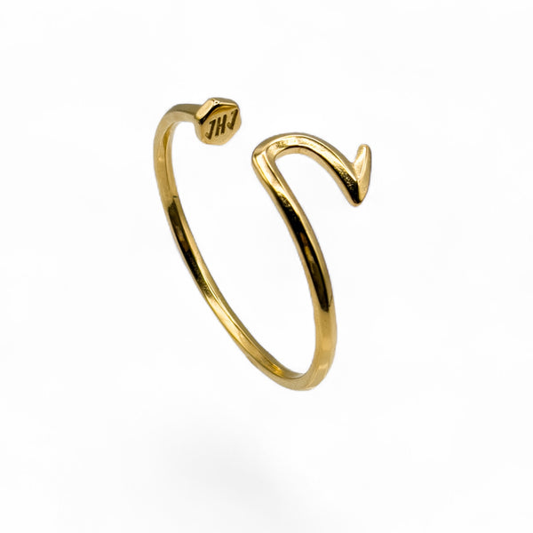 Gold bracelet on a white background