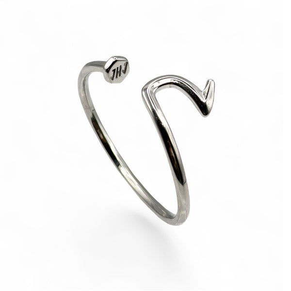 Silver open bracelet on a white background