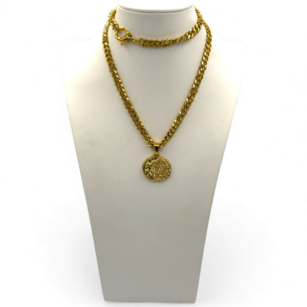 Gold chain necklace with a pendant on a white mannequin bust.