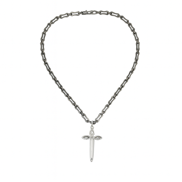 Silver chain necklace with a cross pendant on a white background