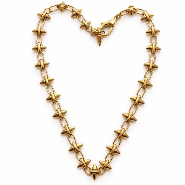 Gold Barbie chain necklace with star-shaped spikes on a white background by jaggedh halo jewelry