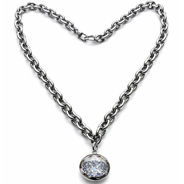 Silver chain necklace with a diamond pendant on a white background