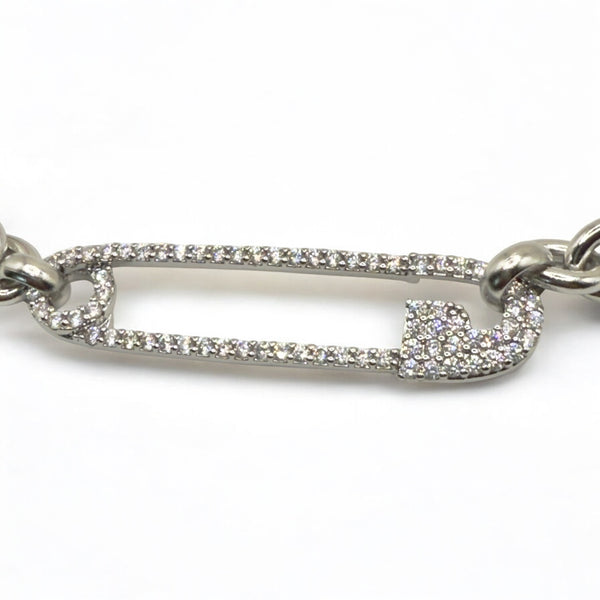 white gold safety pin necklace pave set crystals on a white background