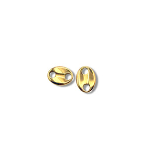 Two gold oval-shaped earrings on a white background