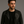 Man wearing a black leather jacket against a gray background The Benson Necklace by Jagged halo Jewelry 