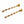 Gold bracelet with decorative links on a white background