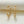 Gold chain-style earrings on a light background