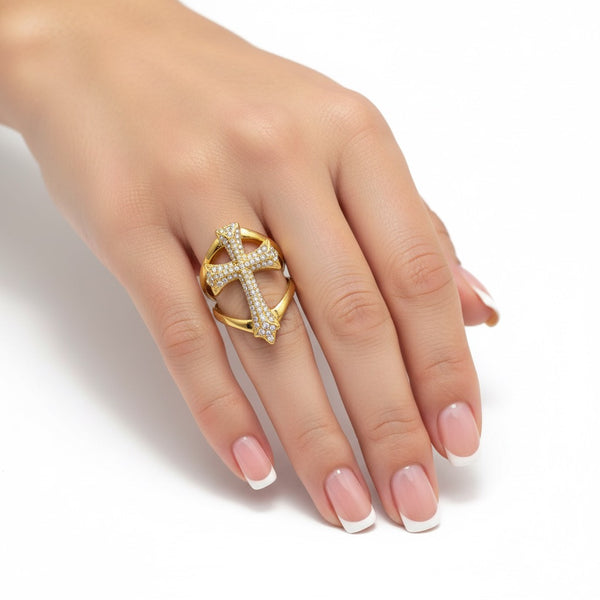 Gold ring with pearls on a hand against a white background by jagged halo jewelry