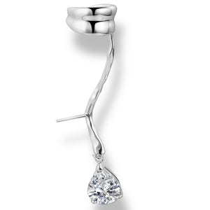 Silver earring with a teardrop-shaped gem on a white background