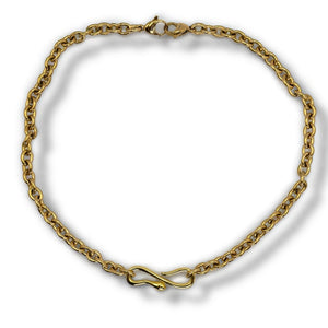 Gold chain bracelet on a white background