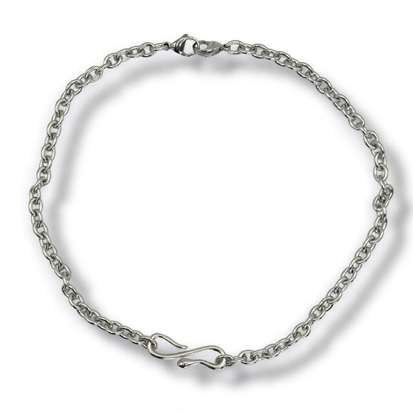Silver chain bracelet on a white background