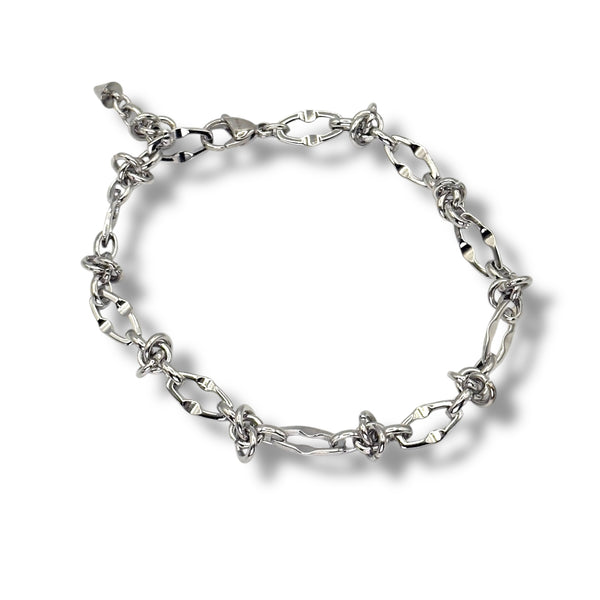 Silver chain bracelet on a white background