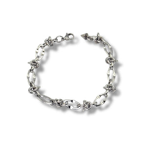 Silver chain bracelet on a white background