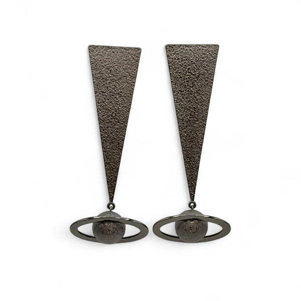 Pair of earrings with triangular designs on a white background