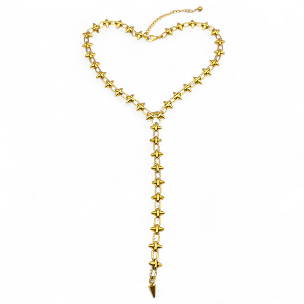 Gold necklace with star-shaped links on a white background
