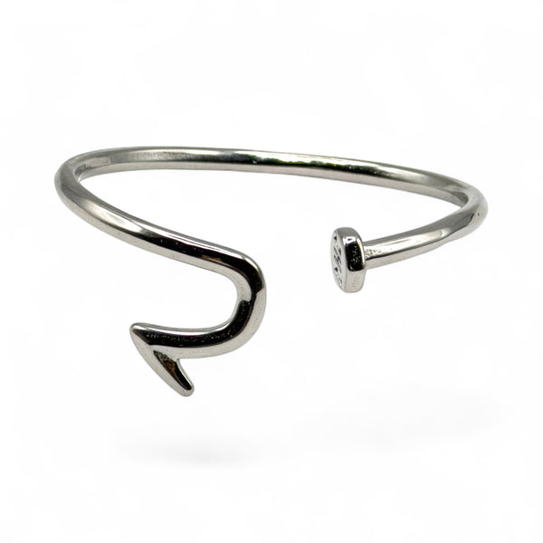Silver bracelet with a unique design on a white background