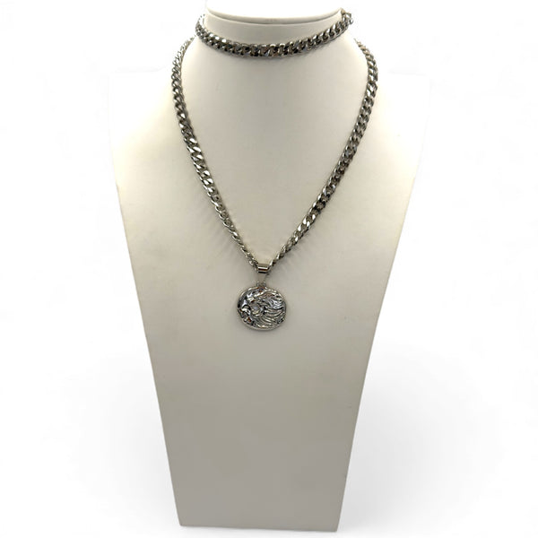 Necklace with a pendant on a mannequin bust against a white background