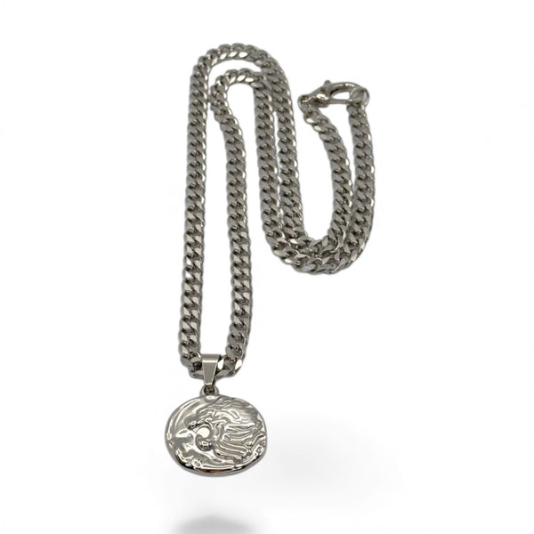 Silver chain necklace with a round pendant on a white background