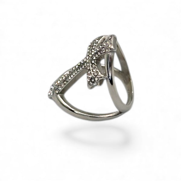 Silver ring with diamond accents on a white background by jagged halo jewelry