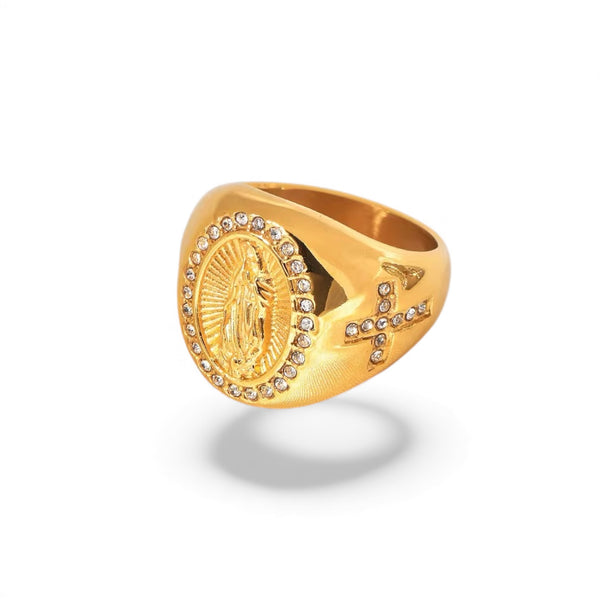 Gold ring with religious emblem and diamond accents on a white background.faith jewelry, catholic jewelry, miraculous medal ring, virgin mary ring, saints collection, religious jewelry, gold stainless steel ring, silver stainless steel ring, cross ring, meaningful jewelry, protective jewelry, women’s faith ring, catholic gift