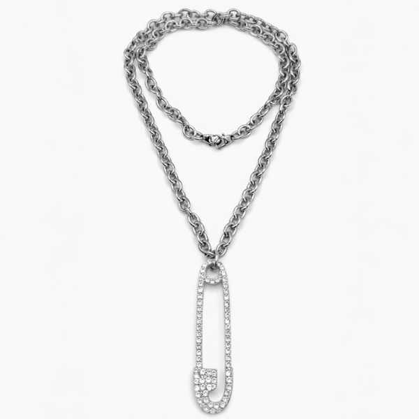 Silver chain necklace with a unique pendant on a white background