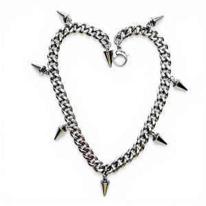 Chain necklace with spike accents on a white background