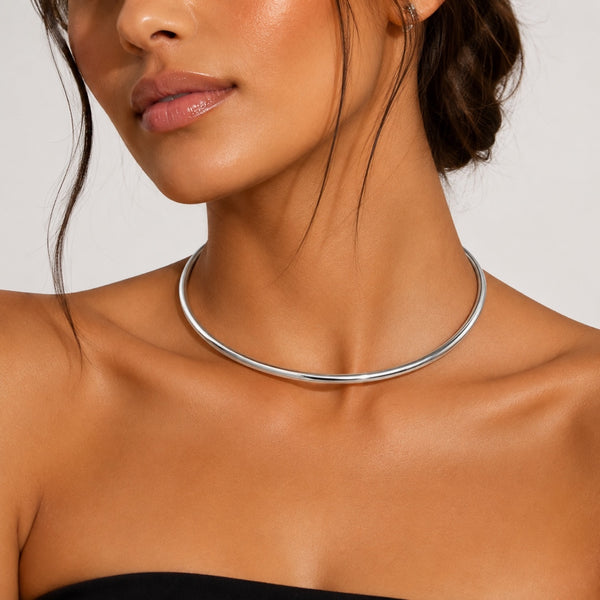 white gold plated stainless steel collar necklace choker jagged halo jewelry brunette model wearing black strapless dress