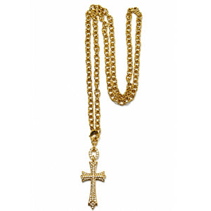 Gold chain necklace with a cross pendant on a white background