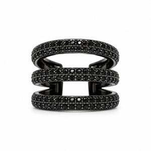A three-band triple pave ear cuff in black metal, embellished with rows of small black gemstones, shown on a plain white background.