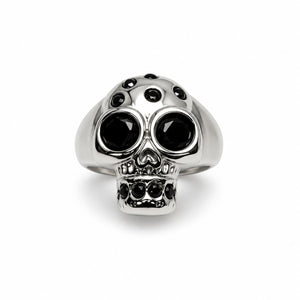 Silver Memento crystal skull ring with black stone eyes, front view