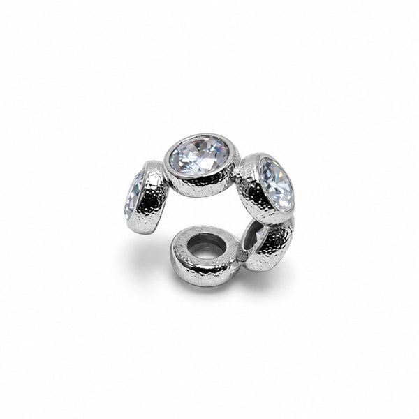 A silver-toned ring charm featuring three bezel-set clear round crystals on a white background.