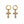 A pair of gold hoop earrings with dangling cross charms paved with small clear stones, shown on a plain white background.