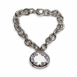 A silver-toned chain bracelet with a heart-shaped arrangement and a large round clear crystal pendant in a bezel setting, shown on a plain white background.